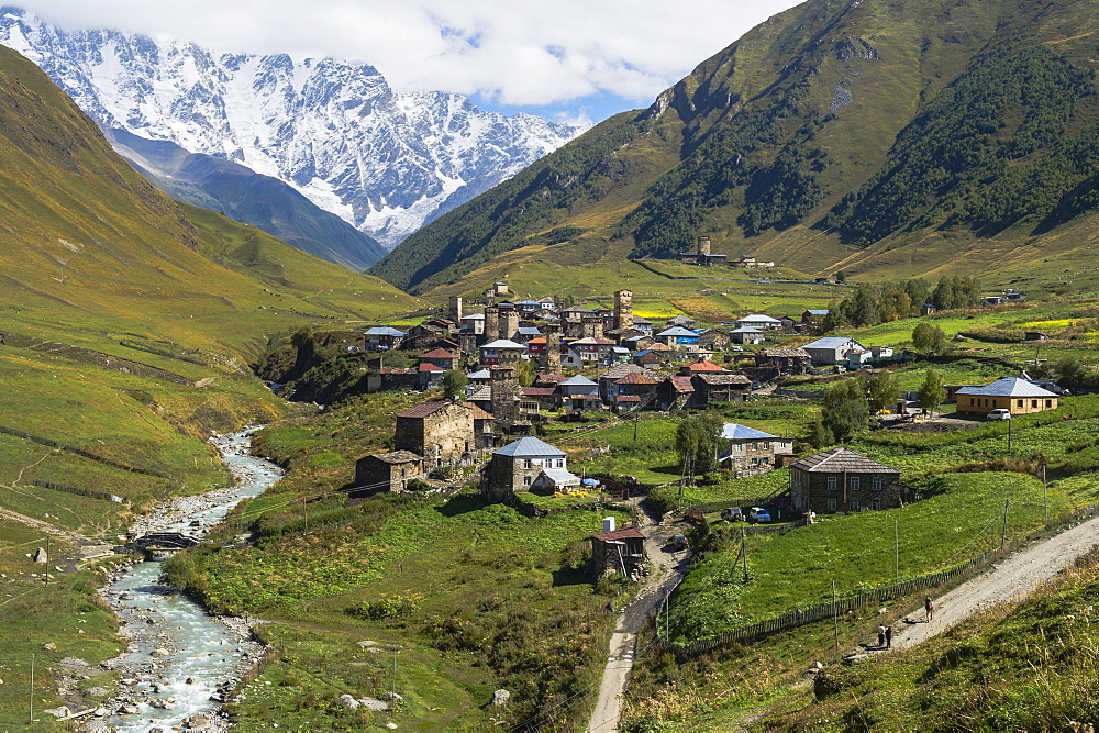 Traditional medieval Svanetian tower houses, Ushguli village, Shkhara Moutains behind, Svaneti region, Georgia, Caucasus, Asia