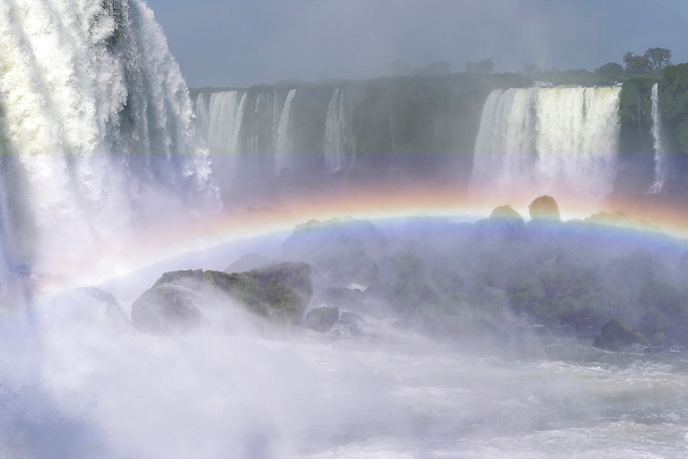 Rainbow over the Iguazu Falls, viewed from the Brazilian side, UNESCO World Heritage Site, Foz do Iguacu, Parana State, Brazil, South America