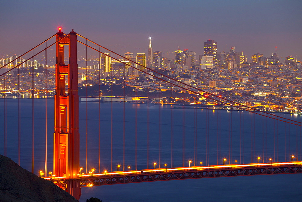 The Golden Gate Bridge and San Francisco skyline at night, San Francisco, California, United States of America, North America