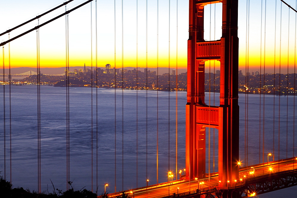 Golden Gate Bridge and San Francisco skyline at dawn, San Francisco, California, United States of America, North America