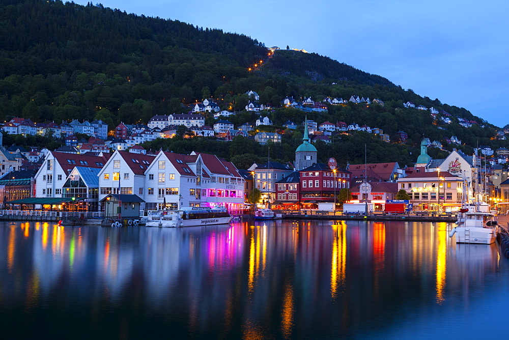 Bergen's picturesque Bryggen District illuminated at dusk, UNESCO World Heritage Site, Bergen, Hordaland, Norway, Scandinavia, Europe