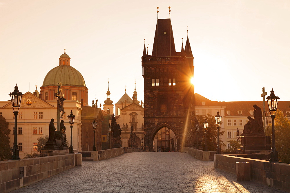 Old Town Bridge Tower and Charles Bridge at sunrise, UNESCO World Heritage Site, Prague, Bohemia, Czech Republic, Europe 