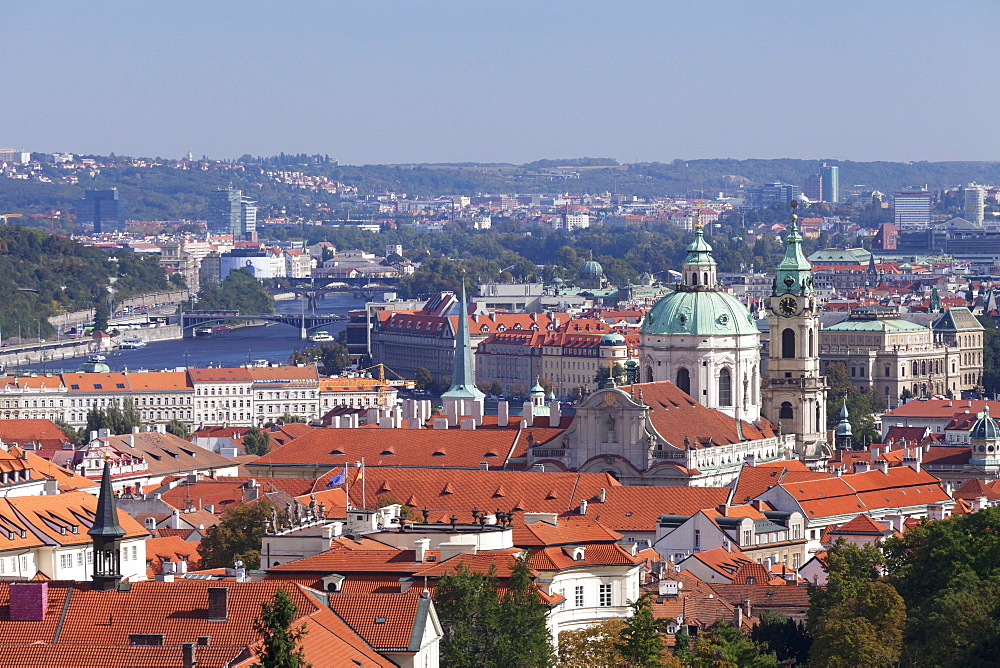 View from Castle District (Hradcany) to Mala Strana suburb with Dome and Tower of St. Nicholas Church and Vltava River, Prague, Bohemia, Czech Republic, Europe 