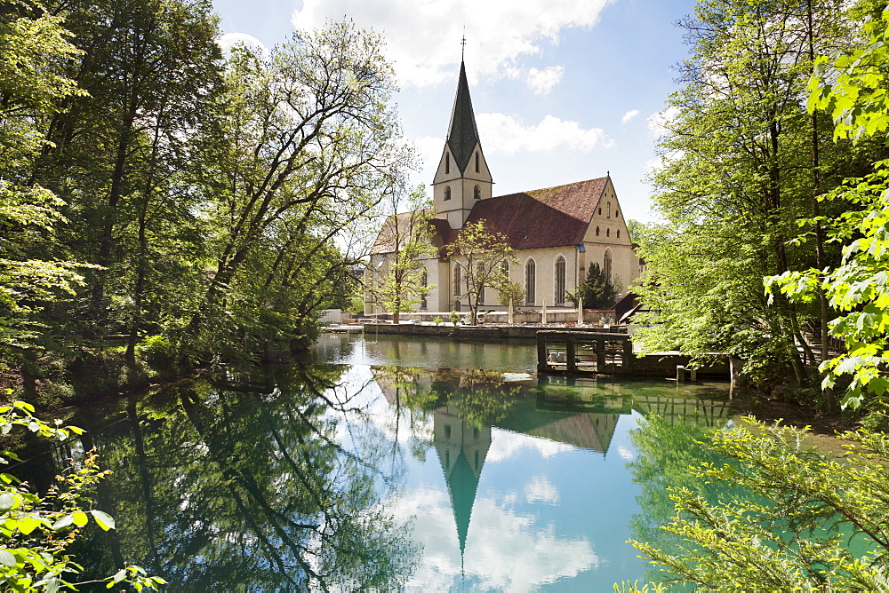 Church of Blaubeuren Monastry reflecting in Blautopf Spring, Blaubeuren, Swabian Alb, Baden Wurttemberg, Germany, Europe