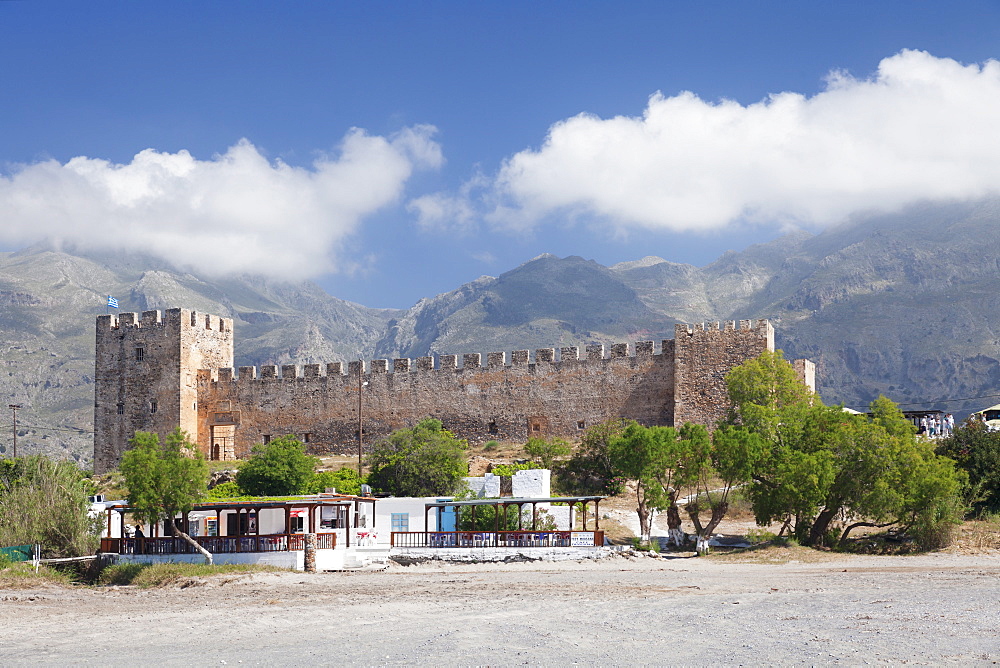 Venetian Castle in front of Lefka Ori Mountains (White Mountains), Frangokastello, Chania, Crete, Greek Islands, Greece, Europe