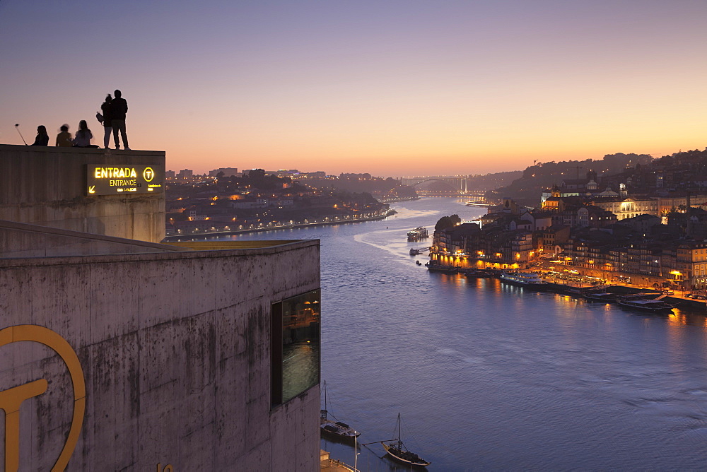 View from Vila Nova de Gaia View over Douro River at sunset to Ribeira District, UNESCO World Heritage Site, Porto (Oporto), Portugal, Europe