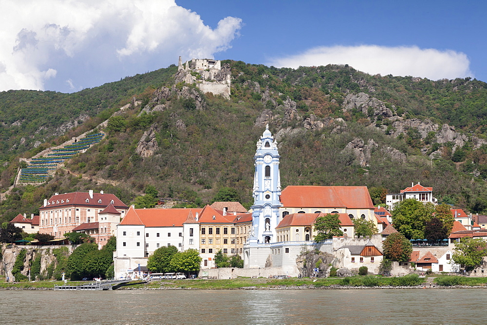 View over Danube River to Collegiate church and castle ruins, Durnstein, Wachau, Lower Austria, Europe