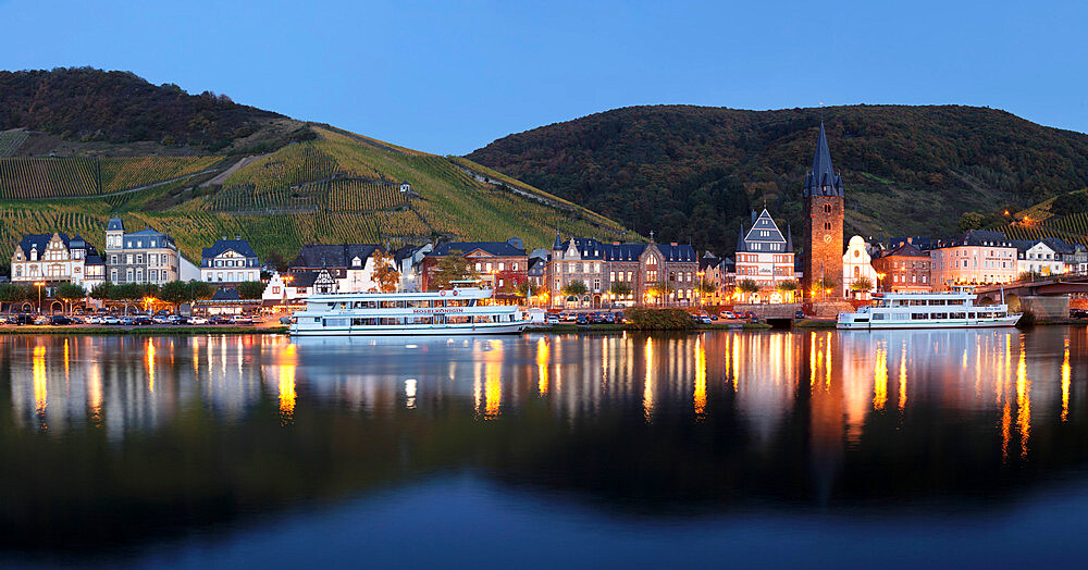 Bernkastel-Kues reflected in Moselle River, Rhineland-Palatinate, Germany, Europe