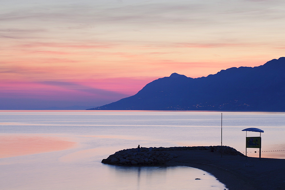 Sunset at the beach of Baska Voda, Makarska Riviera, Dalmatia, Croatia, Europe