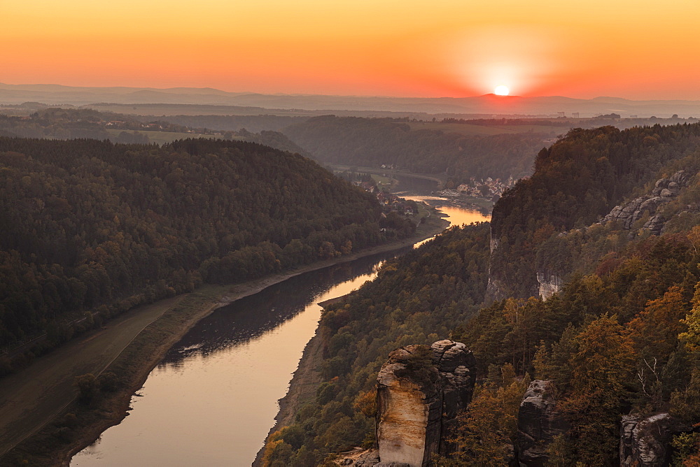 Elbe river at sunset in Elbe Sandstone Mountains, Germany, Europe