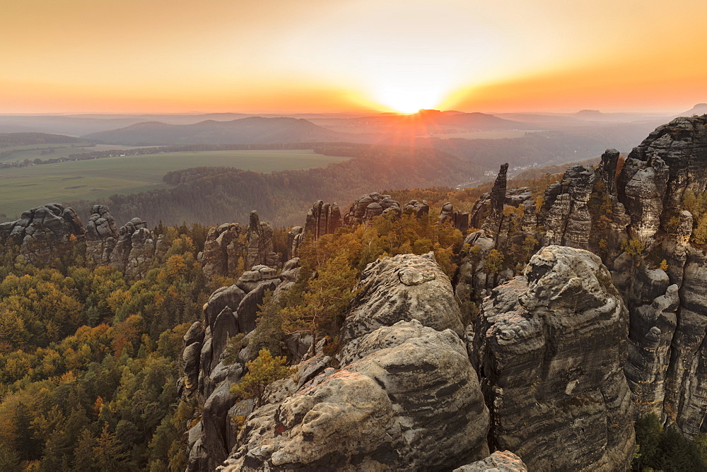 Schrammsteine rocks at sunset in Elbe Sandstone Mountains, Germany, Europe