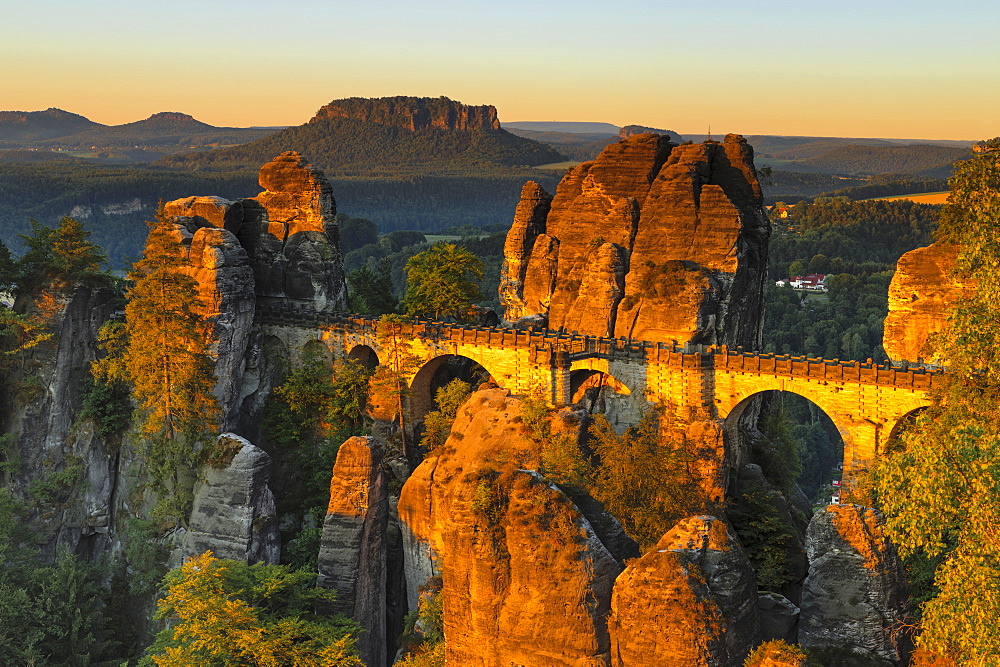 View from Bastei Bridge at sunrise to Lilienstein Mountain, Elbsandstein Mountains, Saxony, Germany, Europe