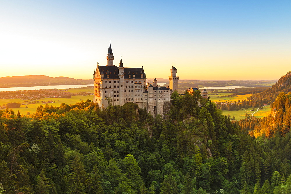 Neuschwanstein Castle at sunset, view to Forggensee Lake, Schwangau, Allgau, Schwaben, Bavaria, Germany, Europe