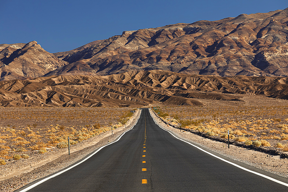 Road through Death Valley National Park, Funeral Mountains, California, United States of America, North America