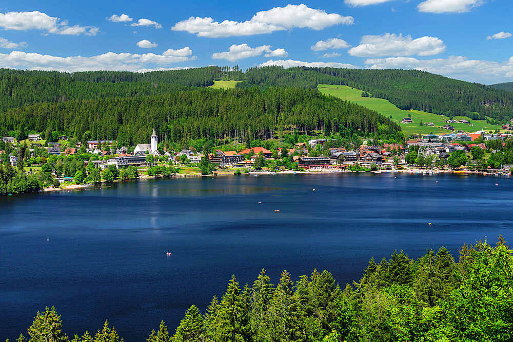 View over Titisee lake to Titisee Town, Black Forest, Baden-Wurttemberg, Germany, Europe