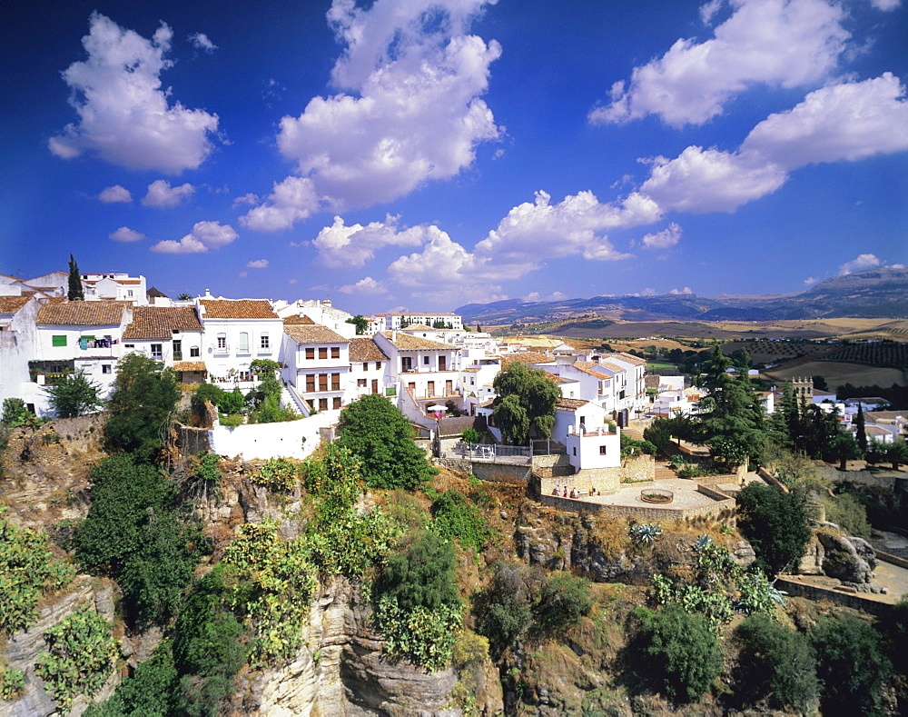 Houses on a gorge, old town of Ronda with cumulus clouds, Province Malaga, Andalusia, Spain, Europe 