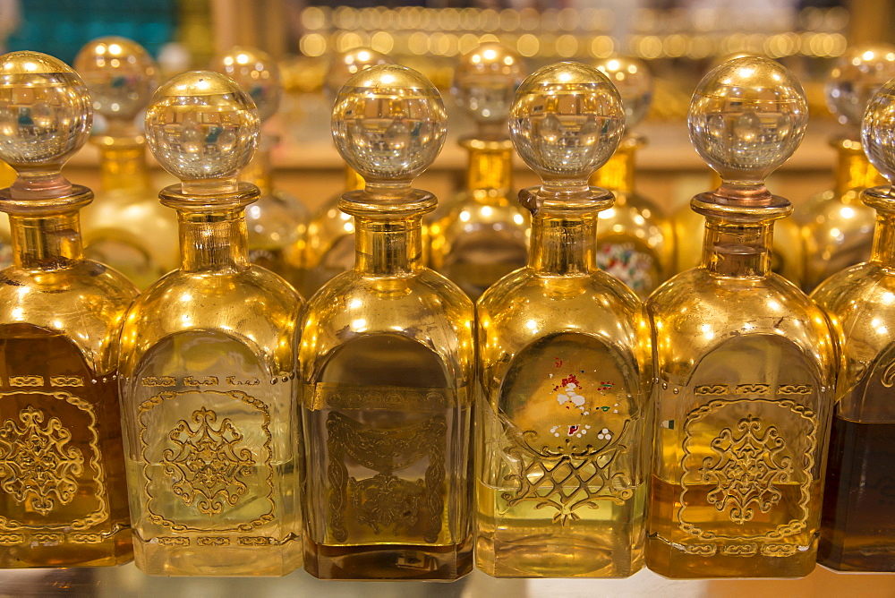 Local frankincense perfumes in ornate gold and glass bottles, Al-Husn Souq, Salalah, Dhofar Region, Southern Oman, Middle East