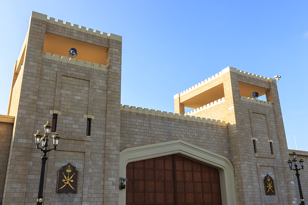 Battlements and huge teak gates of Al-Husn, Sultan's Palace, Salalah, Dhofar Region, Southern Oman, Middle East