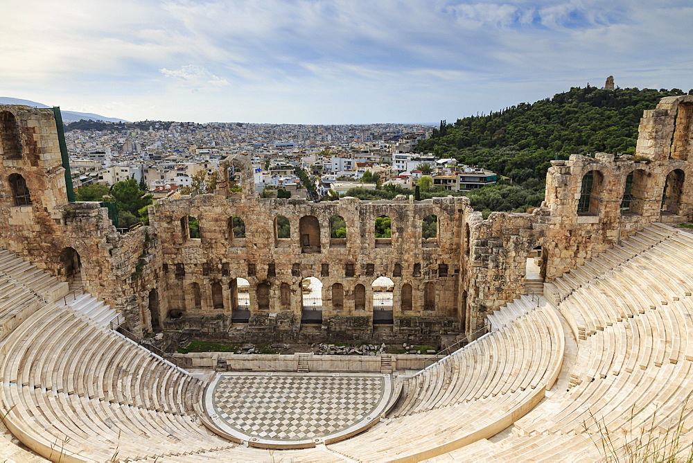 Theatre of Herod Atticus below the Acropolis with the Hill of Philippapos and city view, Athens, Greece, Europe