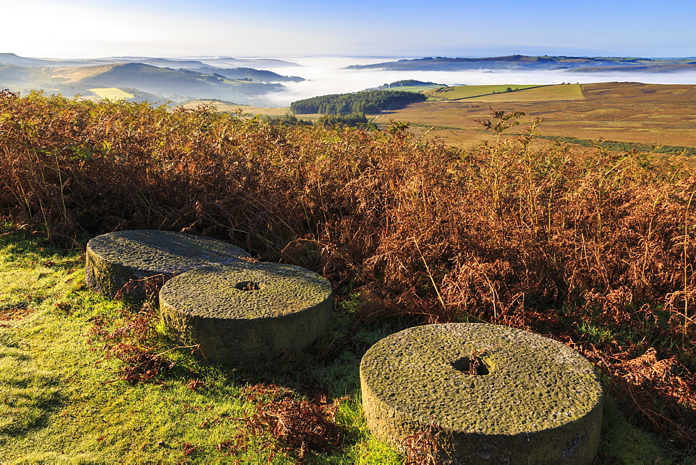 Millstones, bracken, fog of temperature inversion, Stanage Edge, early autumn, Peak District National Park, Derbyshire, England, United Kingdom, Europe