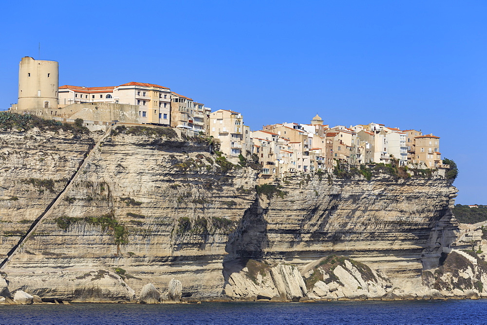 Old citadel, with Aragon steps, atop cliffs, from the sea, Bonifacio, Corsica, France, Mediterranean, Europe