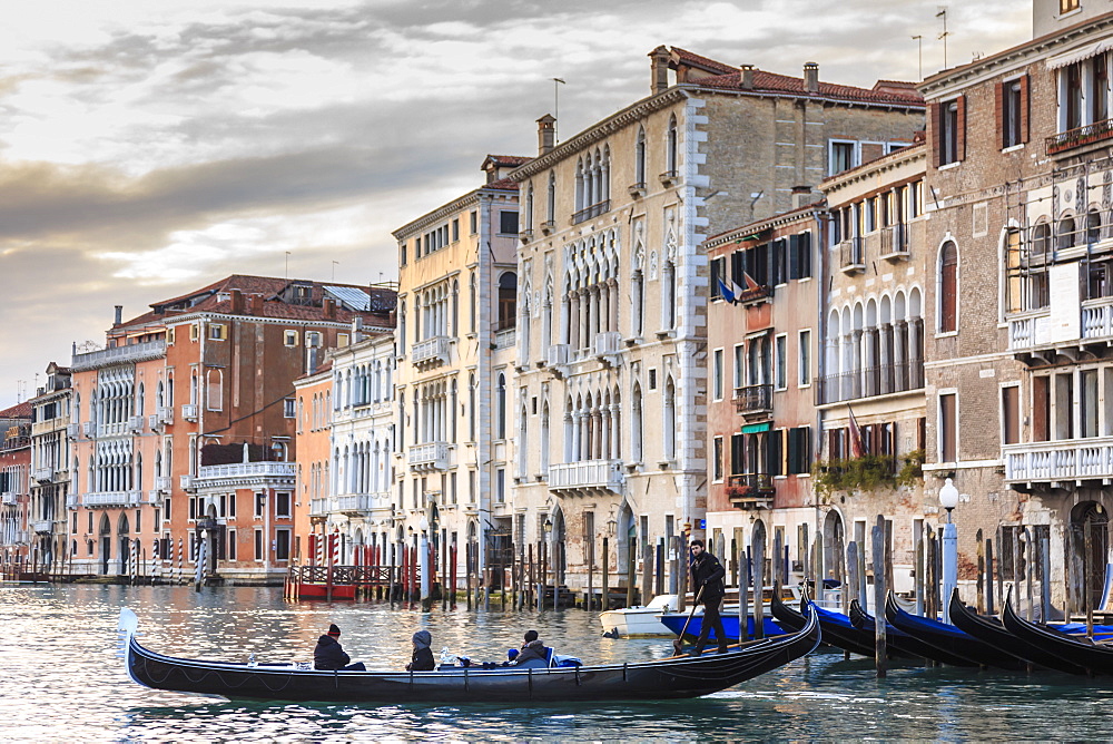 Gondola, La Volta, Grand Canal, elaborate Gothic palazzi at sunset in winter, Venice, UNESCO World Heritage Site, Veneto, Italy, Europe