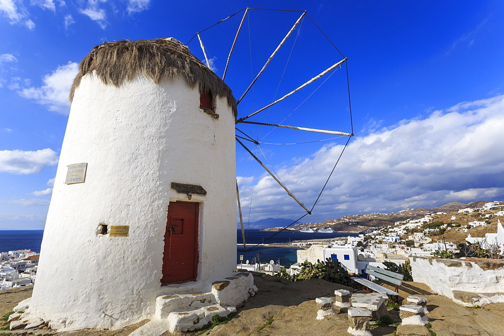 Whitewashed windmill, view of Mykonos Town (Chora) and cruise ships in distance, Mykonos, Cyclades, Greek Islands, Greece, Europe