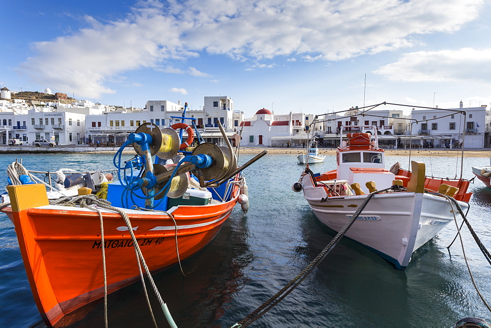 Colourful boats in harbour, whitewashed Mykonos Town (Chora) with windmills and churches, Mykonos, Cyclades, Greek Islands, Greece, Europe