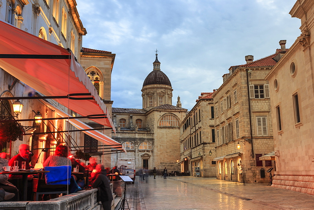 Cathedral and busy outdoor cafe, evening blue hour, Old Town, Dubrovnik, UNESCO World Heritage Site, Dalmatia, Croatia, Europe