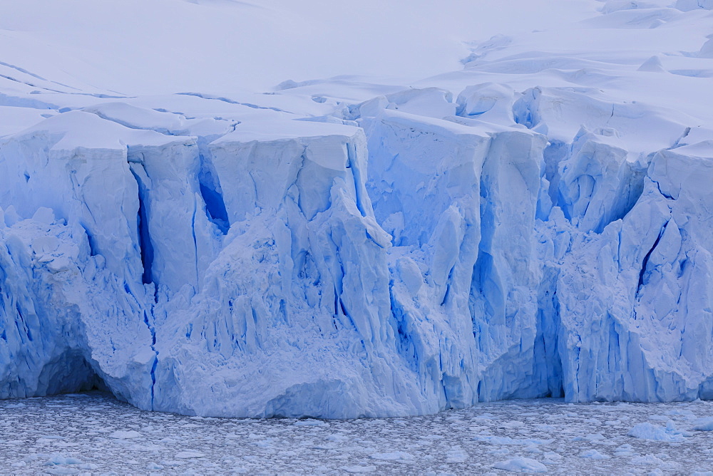 Blue glacier overlook, with crevasses and brash ice filled bay, early morning, Neko Harbour, Antarctic Continent, Antarctica, Polar Regions