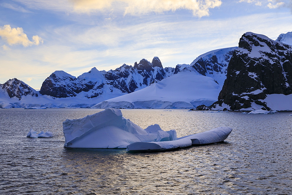 Sunrise, atmospheric clouds, mountains, glaciers and icebergs, Danco Coast, Gerlache Strait, Antarctic Peninsula, Antarctica, Polar Regions