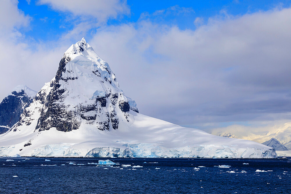 Mountains and glaciers of Cape Errera with blue sky, Wiencke Island, from Bismarck Strait, Antarctic Peninsula, Antarctica, Polar Regions