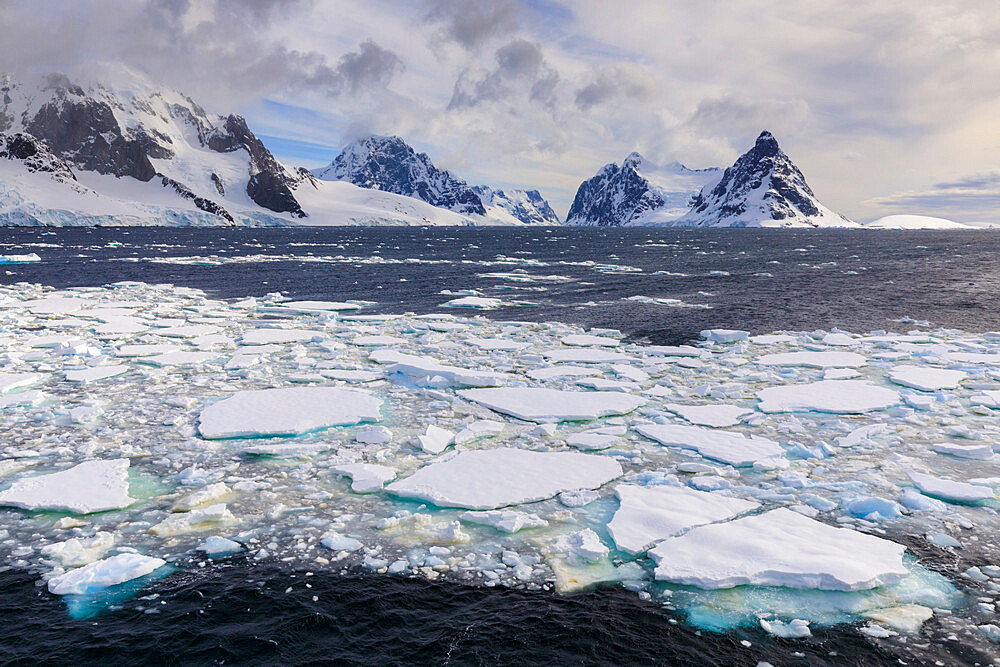 Sea ice and Lemaire Channel entrance, between Kiev Peninsula and Booth Island, evening light, Antarctic Peninsula, Antarctica, Polar Regions