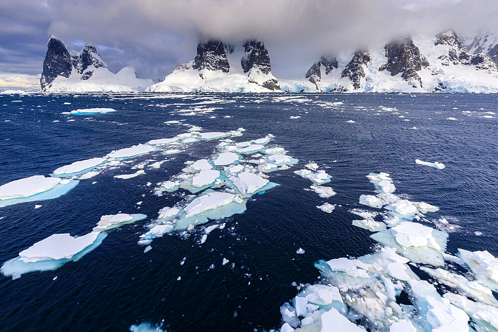 Sea ice off Una Peaks and False Cape Renard, Lemaire Channel entrance, Antarctic Peninsula, Antarctica, Polar Regions