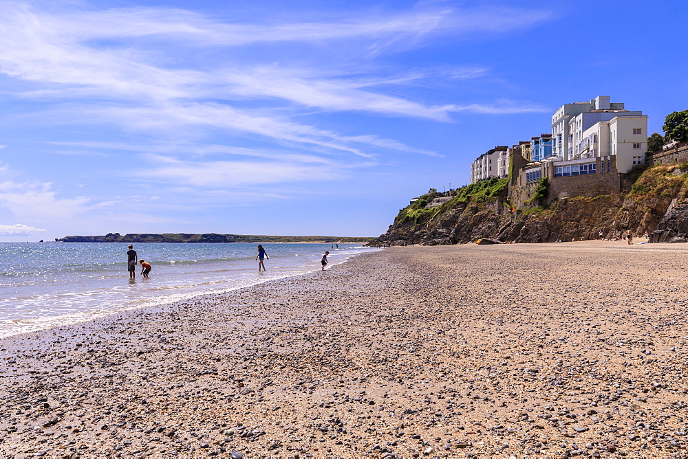 Castle Beach, paddling in the sea, on a sunny day in summer, Tenby, Pembrokeshire, Wales, United Kingdom, Europe