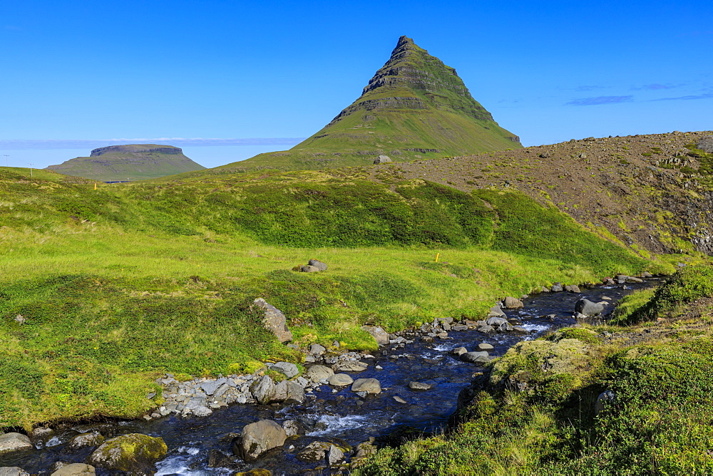 River by Kirkjufell mountain in Grundarfjordur, Iceland, Europe