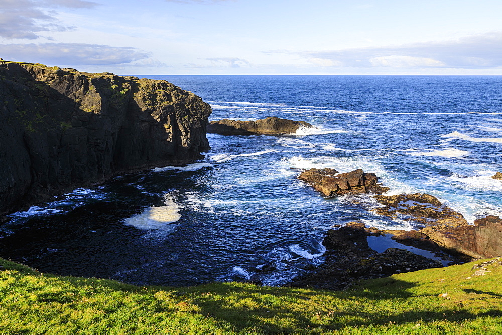 Frothy seas, Eshaness, jagged cliffs, stacks, geos and blow holes, Northmavine, Shetland Isles, Scotland, United Kingdom, Europe