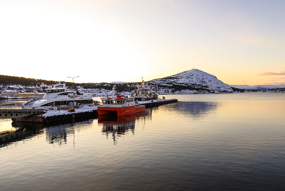 Port, ferry and boats, Altafjord, sea, mountains, snow, winter sunset, Alta, Troms og Finnmark, Arctic Circle, North Norway, Scandinavia, Europe