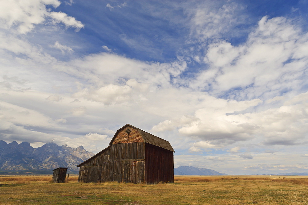 Mormon Row barn under a big sky in autumn (fall), Antelope Flats, Grand Teton National Park, Wyoming, United States of America, North America