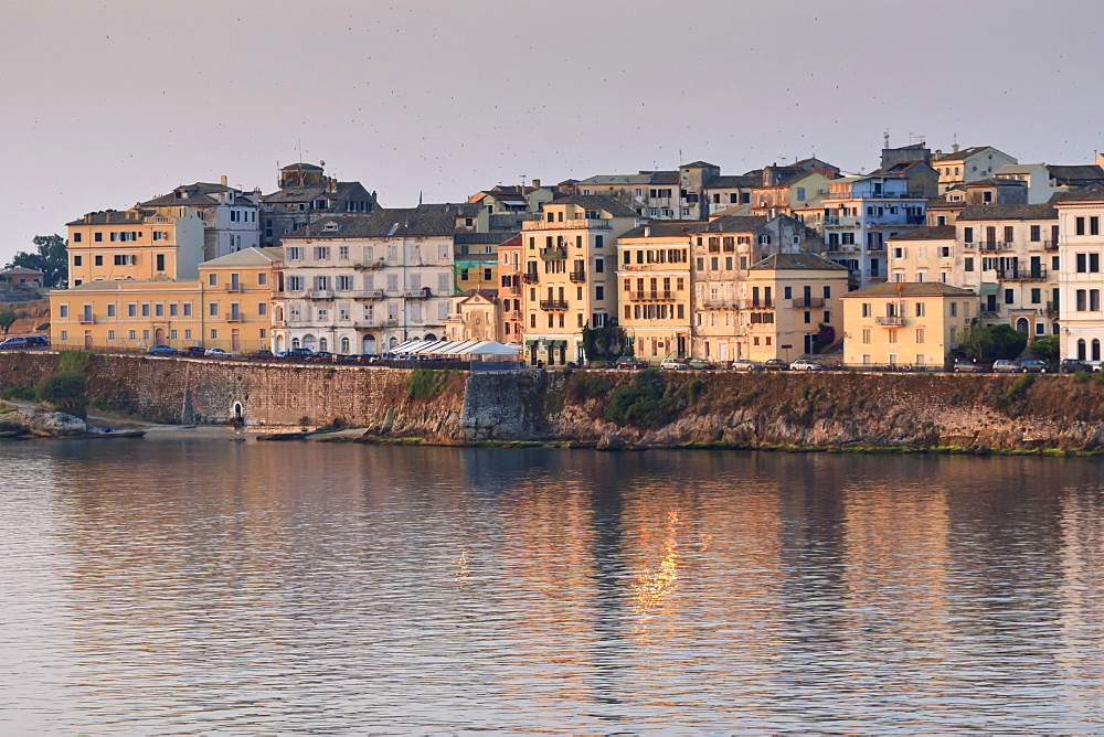 Summer sunrise on the waterfront, Old Town from the sea, Corfu Town, UNESCO World Heritage Site, Corfu, Ionian Islands, Greek Islands, Greece, Europe