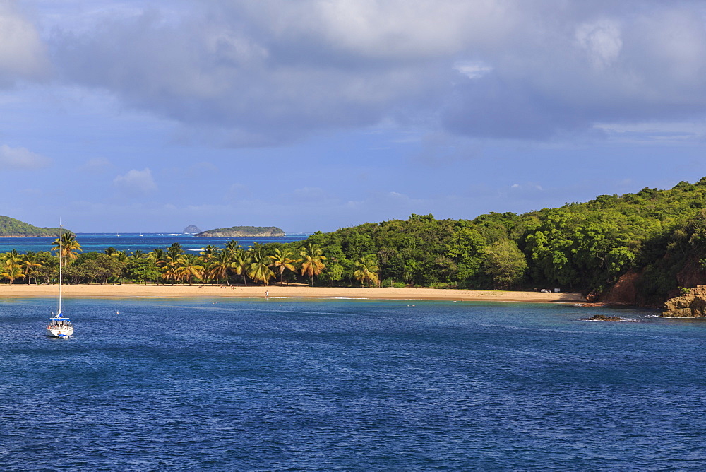 Elevated view across beach at Saline Bay to windward side and Tobago Cays, Mayreau, Grenadines of St. Vincent, Windward Islands, West Indies, Caribbean, Central America