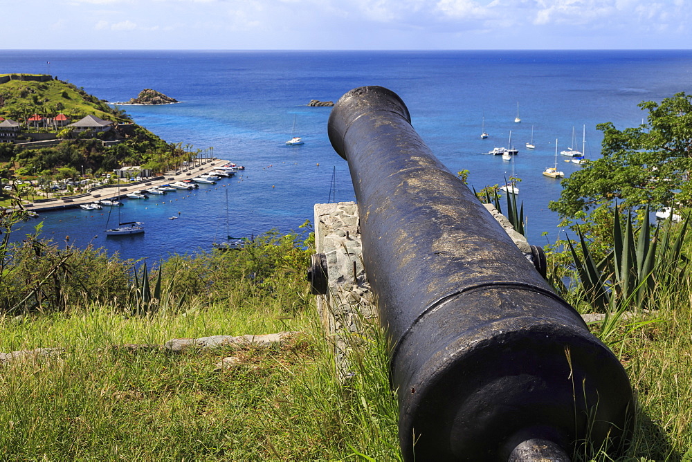 Cannon points out to sea and Les Petits Saints islets, Fort Gustave, Gustavia, St. Barthelemy (St. Barts) (St. Barth), West Indies, Caribbean, Central America