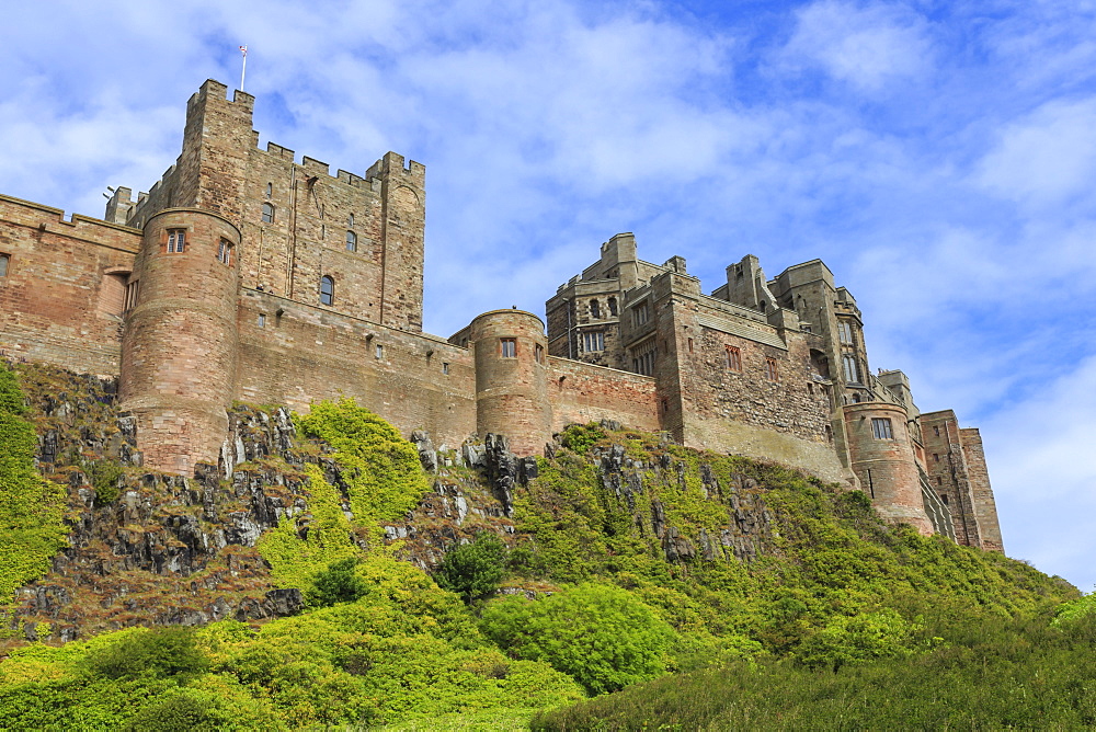 Bamburgh Cast in summer, from below, Northumberland, England, United Kingdom, Europe