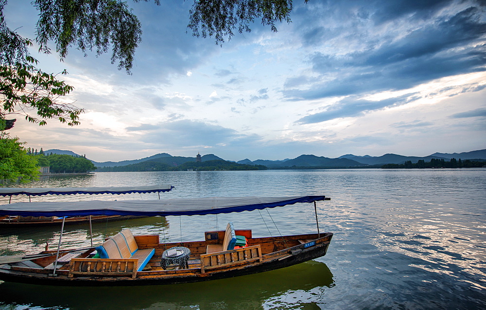 Boats at West Lake shore in Hangzhou, Zhejiang, China, Asia