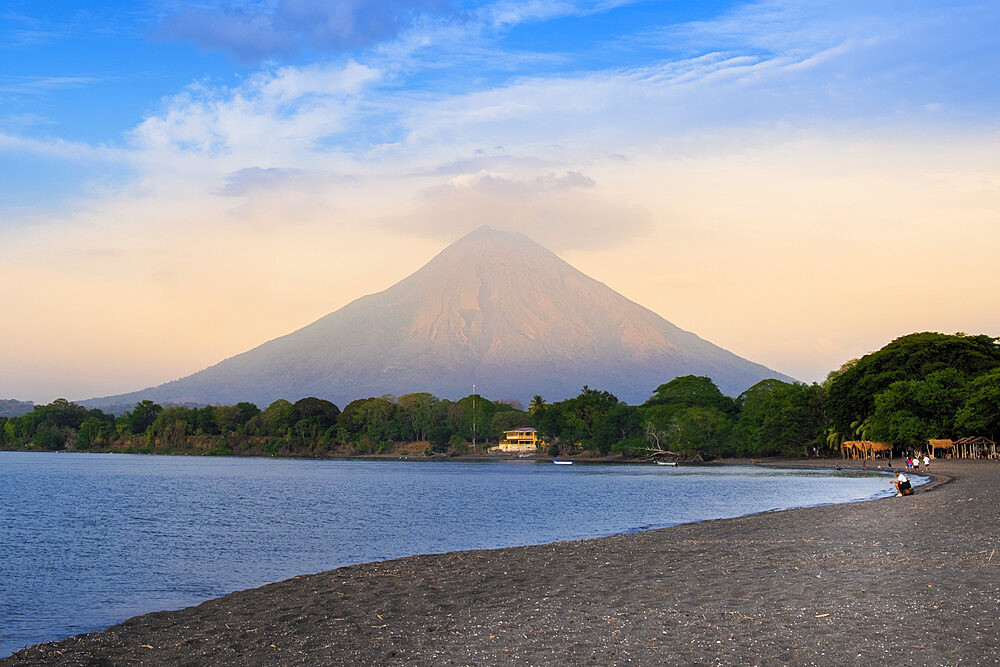 The peak of Concepcion volcano and a black sand beach on Ometepe Island, Lake Nicaragua, Nicaragua, Central America