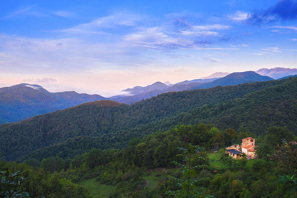 View over the La Garrotxa Volcanic Zone Natural Park towards the foothills of the Pyrenees, Garrotxa, Girona, Catalonia, Spain, Europe