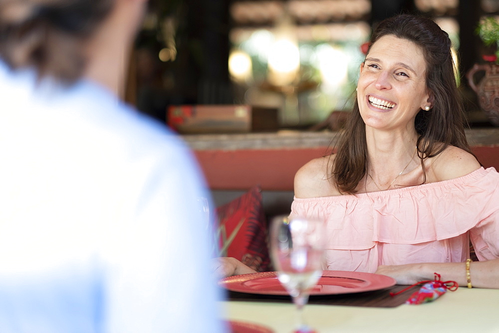 A couple dining together al fresco, Brazil, South America