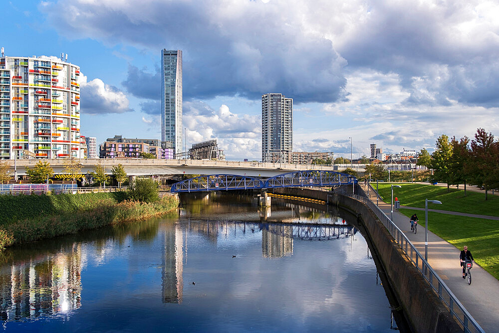 Cyclists on the towpath of the River Lea, Stratford, East London, London, England, United Kingdom, Europe