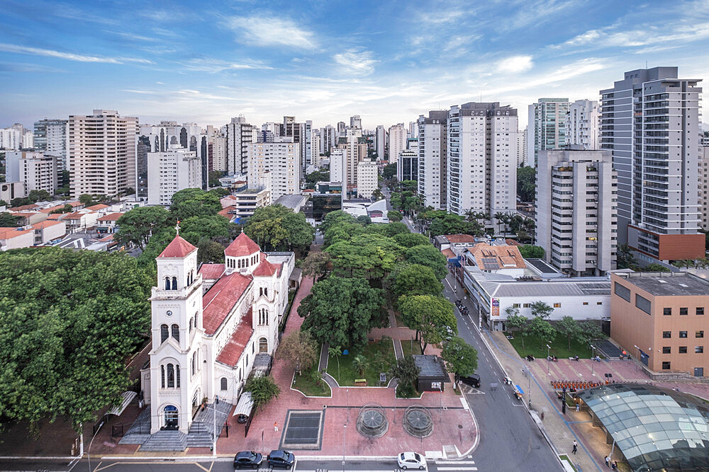 Moema neighborhood, Catholic church of Nossa Senhora Aparecida and upmarket residential apartments, Sao Paulo, Brazil, South America