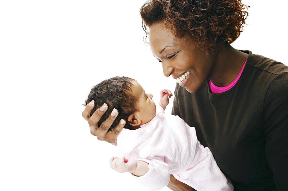 African mother smiling at baby